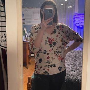 Premise tan flowered blouse.